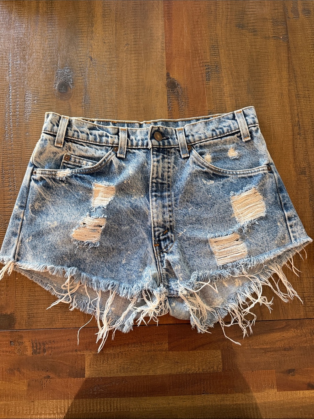 Levi’s Distressed Light Blue Denim Cutoff Shorts